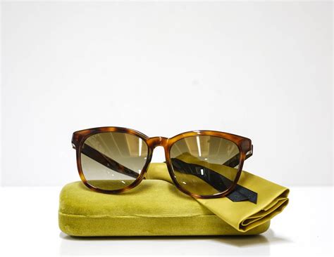 gucci wasp sunglasses|Mask sunglasses in gold.